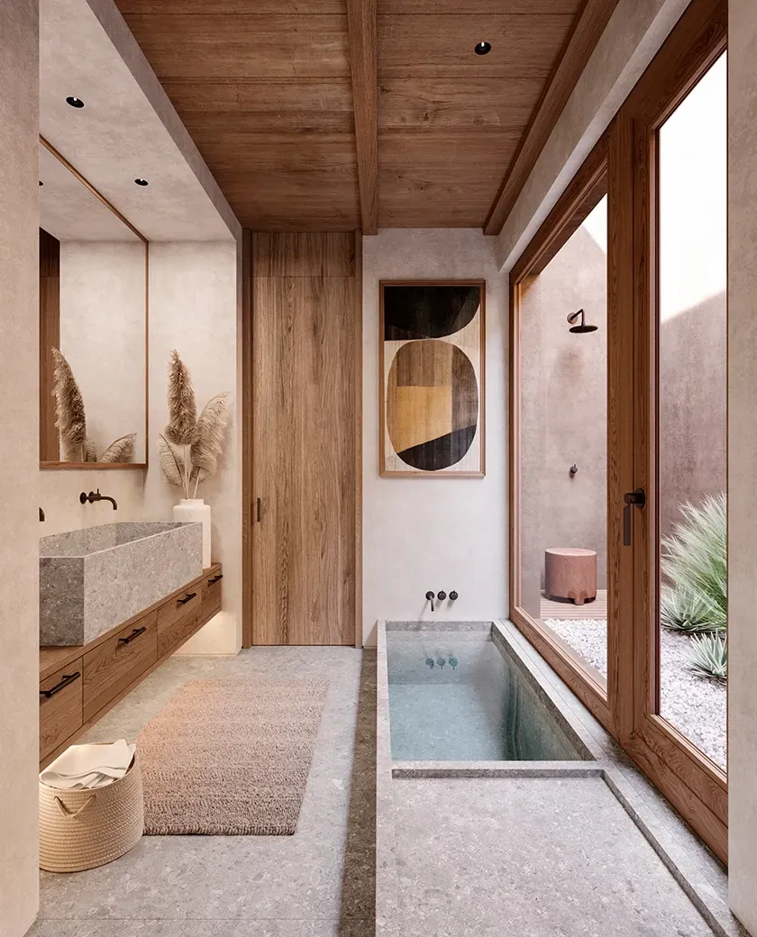 Minimalist bathroom in warm tones with a built-in stone bathtub and wooden ceiling.