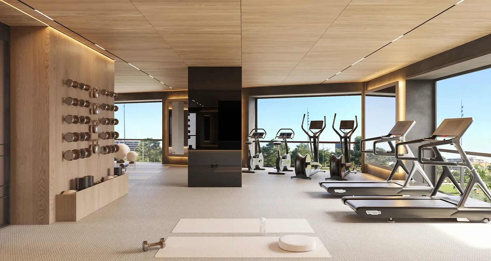 Modern luxury gym with panoramic windows, premium Technogym equipment, and sleek wooden detailing for a sophisticated wellness experience.