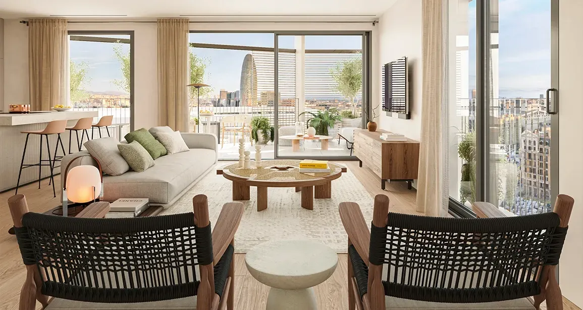 Contemporary living space with earthy tones, stylish wood and rope chairs, and sweeping terrace views including the iconic Torre Glòries.