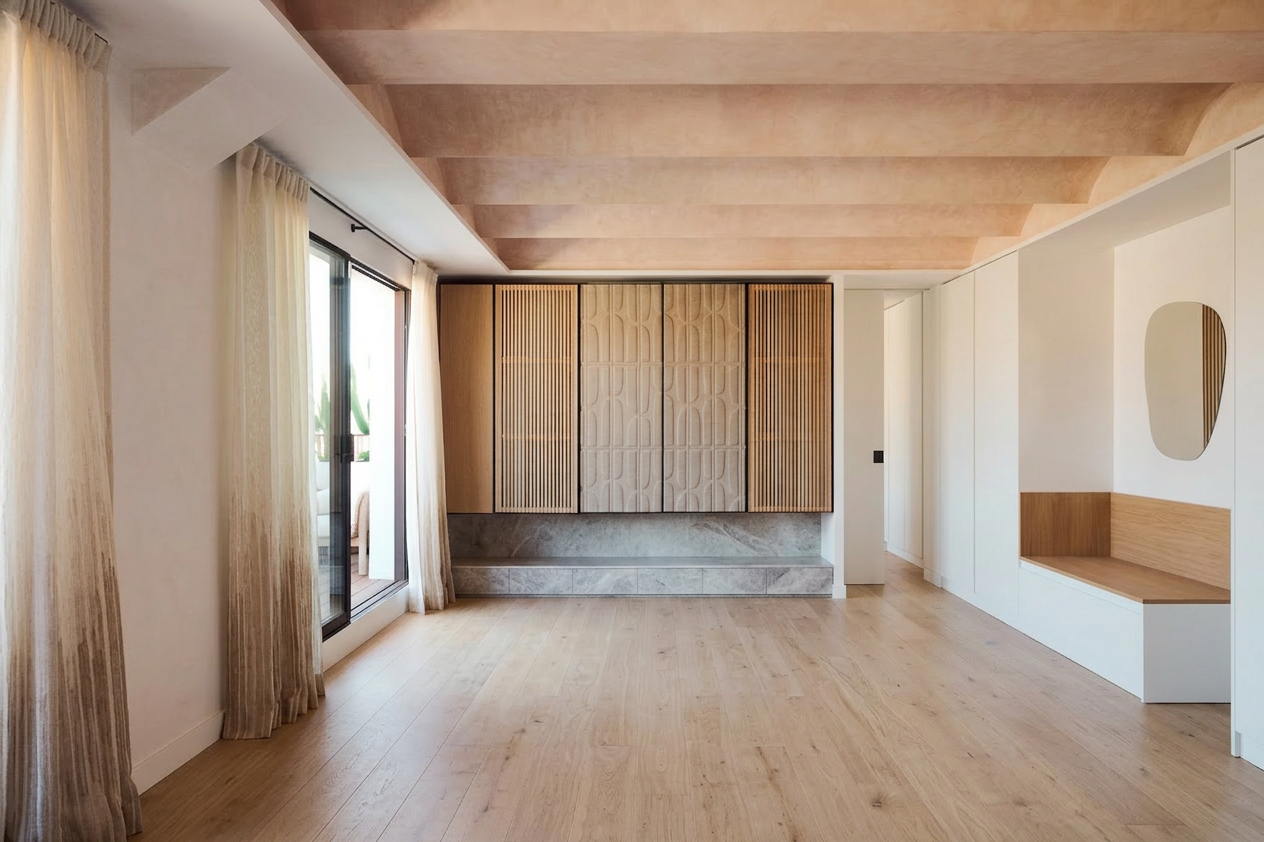Open living room with custom wood cabinetry, textured ceiling and natural light in a modern apartment