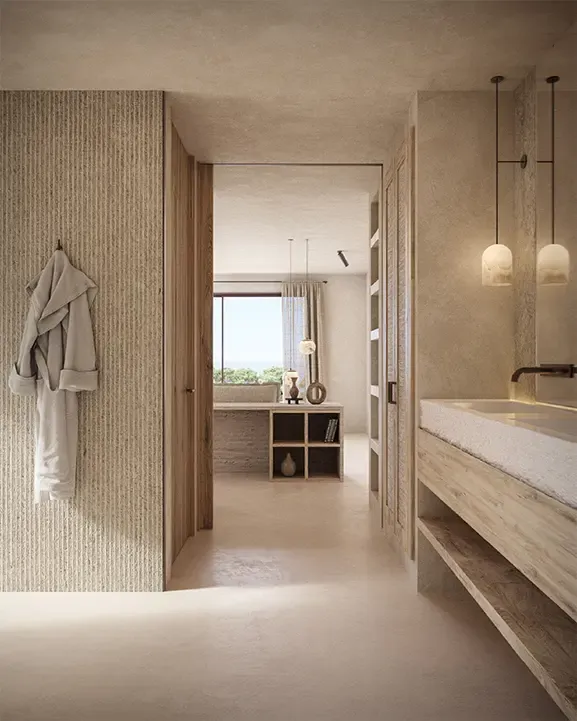 Contemporary bathroom with natural stone sink, warm lighting and soft neutral interior design in Cala Comte villa